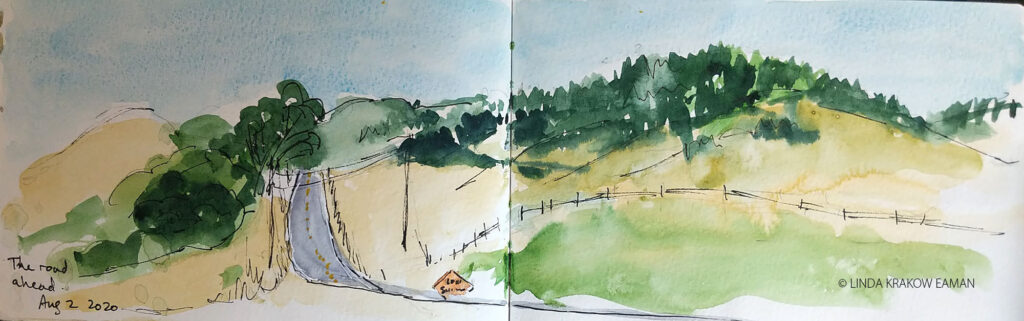 Watercolour sketch by Linda Krakow Eaman, of an uphill road surrounded by green trees and golden hills. Caption "The Road Ahead."